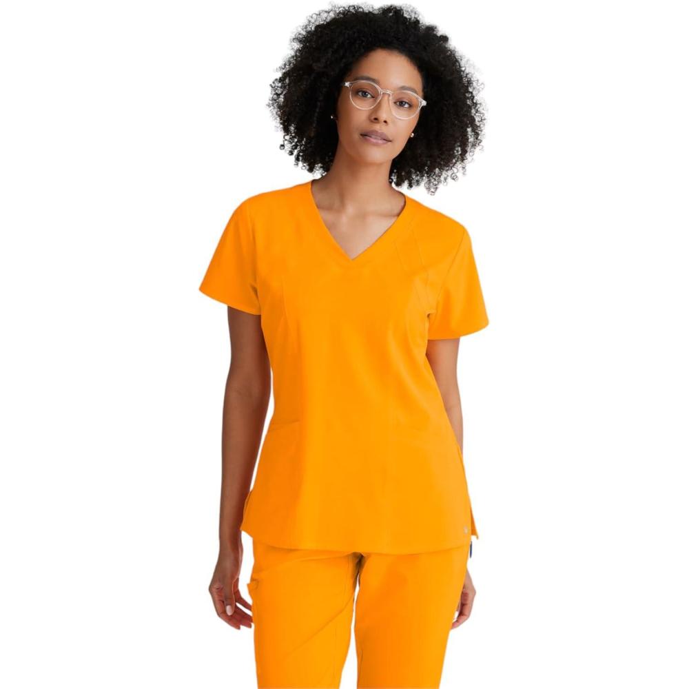 imageBARCO ONE  Womens Racer Top VNeck Medical Scrub Top w 4 Pockets and 360 Spandex Stretch FabricBright Turmeric