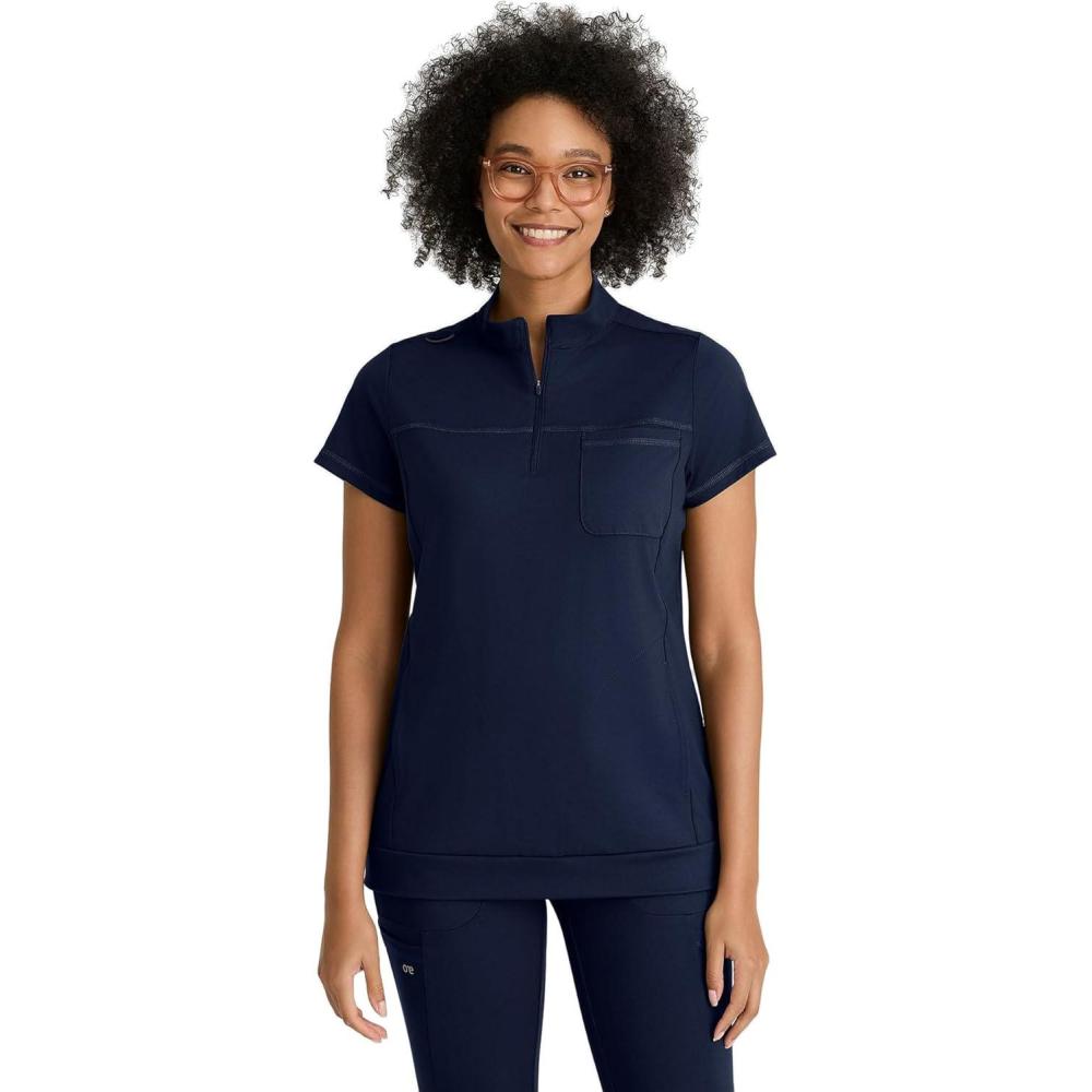 imageBARCO One Performance Knit Vigor Classic Fit Scrub Top for Women  3Pocket Mock Neck Shirt with Moisture Wicking FabricIndigo